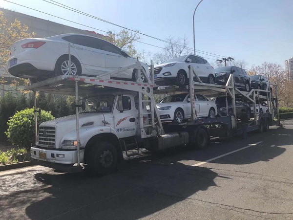 北京到新疆托運一輛車需要多少費用？自駕游運車與商品車托運有什么區別?